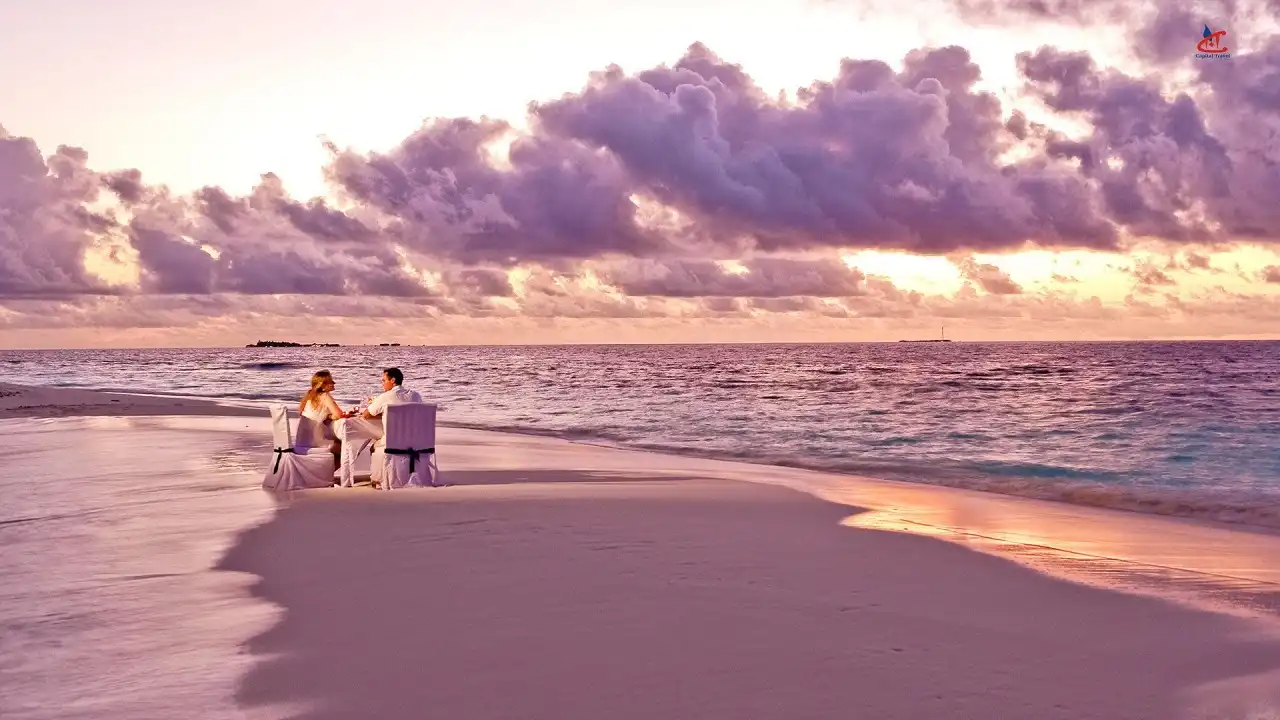 Romantic Maldives honeymoon couple on beach